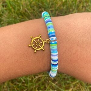 A handmade clay bead bracelet